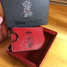 Your everyday necessities are easy to access inside the wallet with five credit card slots, one bill pocket. Coach Accessories Mickey Mouse X Coach Keychain Card Holder Poshmark