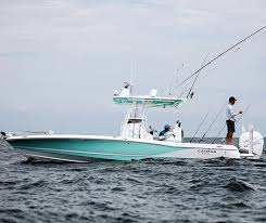 The tuna fish is a 30ft fiberglass phoenix tournament yacht with seating for two crew members and five fishermen. Caymas Boats