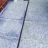 Do it yourself, install a patio drain. 1