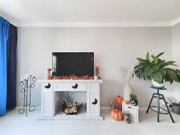 Shiplap details help to create a rustic cottage feel alongside brilliant fire that can be enjoyed with or without heat for a cozy home all year long. Faux Fireplace Mantel Ikea Hack