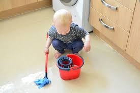 Give The Child A Mop Cleaning The Floor Montessori Style Mopping Floors Toddler Cleaning Montessori Toddler
