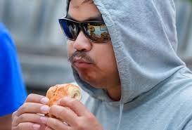 Competitors challenge their stomachs in hot dog eating contest