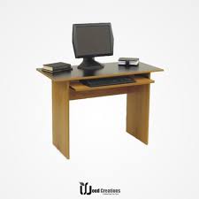 It features an accessory shelf atop a storage cabinet, a keyboard panel equipped with a safety stop, 2 drawers and a file cabinet. Easy Computer Table 201