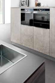 kuchenschranke mit beton optik passen toll zu edelstahl und hochwertigen einbaugeraten kuche beton kuche betonoptik kuchentrends