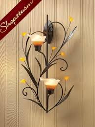 The decmode rustic wall mount sconce with amber glass adds subtle lighting to your hallway or foyer. Glass Amber Lilies Floral Candle Holder Wall Sconce Centerpiece Candle Wall Sconces Candle Holder Wall Sconce Wall Candle Holders