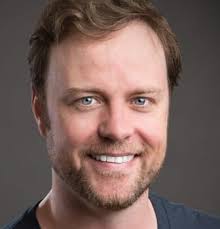 Tom Story plays God in Signature Theatre's An Act of God