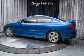 Image result for Arrival Blue 2004 Pontiac