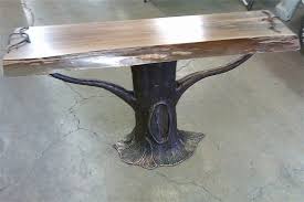 10 years ago i made a tree stump table. Custom Sculptural Tree Table With Live Edge Top By Intuitive Iron Custommade Com