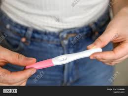 Home pregnancy tests measure the amount of hcg in your urine. Young Woman Holding Image Photo Free Trial Bigstock