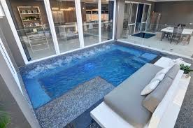 Hgtv loves this courtyard swimming pool and patio, which has steppingstones and a hot tub, and a covered outdoor kitchen and lounge nearby. 2014 Gold Winner Residential Courtyard Plunge Pool Pools By Design Concrete Pool Builders Osborne Park Perth