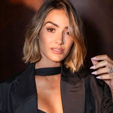 Michelle Keegan just wore a tweed jumpsuit with a bag by Kate Middleton's  favourite designer