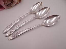 I have a rogers bros teapot, ornately engraved. Set Of 3 Antique Wm Rogers 1941 Triumph Silverpate Teaspoons Rogers Triumph Silverware International Silver Triumph Teaspoons Silver Silverware Settings