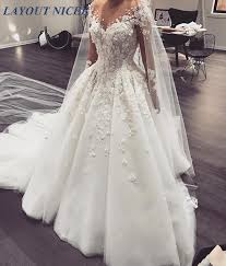 Wir sind grit & marcel und gemeinsam lieben, leben und lachen wir seite an seite. New Arabic Wedding Dress Sheer Hochzeitskleid Long Sleeves Lace Appliques 3d Flowers Beaded Court Train Tulle Bridal Gowns Buy At The Price Of 133 25 In Aliexpress Com Imall Com