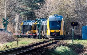 Two trains collide in Denmark, injuring 17 people, emergency service says