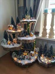 You can use the different levels of the cabinet to set up different scenes within your. 2019 Christmas Village Display Tree 16 Designs Home Decoration