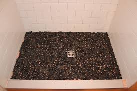Before you start laying tiles you must ensure that the floor is solid, level, clean and dry. Subway Shower With River Rock Floor Tile Art Center