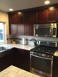 12 Exceptional Ideas Of The Cherry Kitchen Cabinets In Modern Kitchen Cherry Cabinets Kitchen Kitchen Remodel Home Kitchens