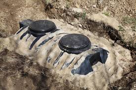 We tell careful homeowners how to build septic systems. Installing A Septic System Sump Pump Gillis Construction