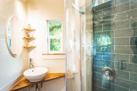 Curtain rods that curve outward take advantage of unused open space to give you a couple of extra inches of elbow room in your tiny shower. How To Deal With A Tiny House Bathroom 12 Inspiring Design Ideas