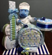 One Of My Favorite Things At Baby Showers Happens To Be Diaper Cakes Or Really Anything Made Out Of Diapers T Diaper Gifts Baby Shower Crafts Diaper Creations