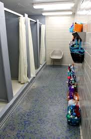 Tower Showers The Women On The 6th Floor Keep Their Shower Organizers In The Bathroom Year Round Shower Organization Flooring Shower