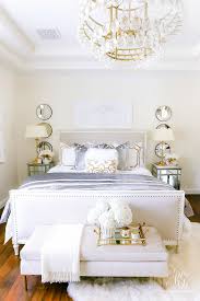 Those rose gold pillows and linen beautify the decor which is dominated by white. Luxurious Silver And Gold Fall Bedroom Randi Garrett Design