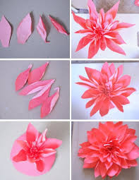 Learn how to make large paper diy flowers for above a bedroom headboard. Diy Wall Art Giant Paper Flower Tutorial Never Skip Brunch