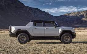 The 2022 gmc hummer ev pickup is here and it looks even wilder than we could have guessed. Gmc Hummer Ev Suv Reveal Dated Watch The Electric Pickup Go Sideways On Ice Slashgear