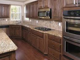 Maple Vs Oak Cherry And Birch Cabinets Clean Kitchen Cabinets Brown Kitchen Cabinets Traditional Kitchen Cabinets