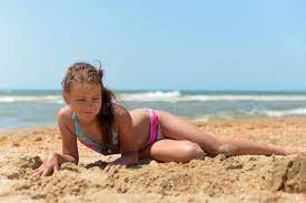 Pretty japanese girls short skirts cool dance next auto show. Teenage Girl Lying On The Sandy Beach Stock Photo Image Of Nature Play 133887836