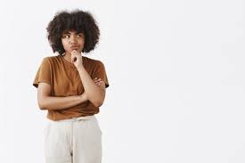 Pixie cuts are unexpectedly versatile. Free Photo Focused Thoughtful Cute Girl With Afro Hairstyle In Brown T Shirt And Pants Smirking Looking Right While Thinking With Doubts