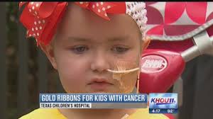 Patients, family hope to raise awareness of children's cancer with gold  ribbons