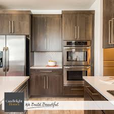 Update your kitchen with our selection of kitchen cabinets from menards. Brass Hardware Adds Handsome Detailing To Flat Panel Cabinets Kitchen Design By Candlelight Homes We Bu Kitchen Design Flat Panel Cabinets New Homes For Sale
