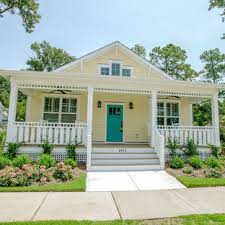 The rich shade of blue acts almost as a neutral for the exterior house paint color. 75 Beautiful Yellow Exterior Home Pictures Ideas July 2021 Houzz