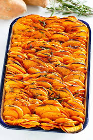 Thinly Sliced And Baked Sweet Potatoes Nicely Stacked On A Baking Tray Ready To Be Served Sweet Potato Recipes Potato Recipes Good Sweet Potato Recipe