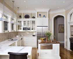 6 ) never run cabinets all the way to the ceiling without a two piece crown molding or a solid wood spacer. Pin By Kelly Junior On Kitchen Kitchen Soffit Above Kitchen Cabinets Kitchen Design
