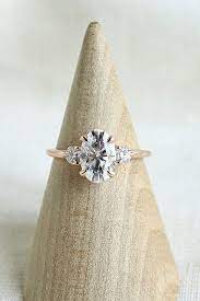 27 Moissanite Engagement Rings That Sparkle Like A Diamond Diamond Engagement Rings Vintage Vintage Engagement Rings Unique Engagement Ring Styles Shape