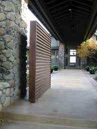 Winder Gibson Architects Napa Valley Home Front Gate To Main Entry Of The Home Metal Driveway Gates Gate Design Mid Century Exterior