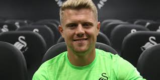 Swansea City sign Jake Bidwell