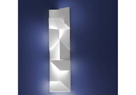 Instead of using lamps, try adding a pair of modern sconces on either side of your bed to free up floor or nightstand space and create points of visual interest on your wall that are as stylish as they are functional. Wall Shadows Long Nemo Wall Lamp Milia Shop