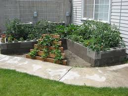 A cinderblock garden can be as simple as placing them in a rectangle and filling in the middle with garden liner and compost! 12 Amazing Cinder Block Raised Garden Beds Off Grid World