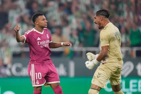 Mbappé has late penalty saved in Real Madrid loss at Betis | AP News
