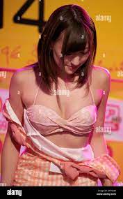 Tokyo, Japan. 31st Aug, 2014. Nozomi Anzaki, August 30, 2014, Tokyo, Japan  : Japanese adult movie actress Nozomi Anzaki takes off her clothes in front  of the cameras during the 12th annual