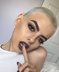 Gorgeous platinum pixie, very short.