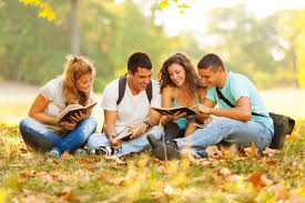Positive college friends communicating and sharing after studying in university. College Friendships Vs High School Friendships Education