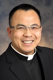 Tuyen Do led to Arkansas by watching a friend's ordination