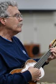 What songs to play at the Woodstock-themed music event?