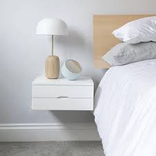 Instead, its legs are mounted to the wall they are attached to, saving 5. Floating Bedside Table In White With Double Drawers Floating Bedside Table Bedside Shelf Bedside Table