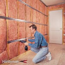 We Ll Teach You How To Add Insulation Acoustical Caulk And An Extra Layer Of Drywall Soundproof Room Sound Proofing Soundproofing Walls