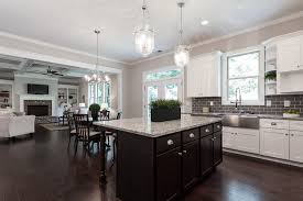 White Shaker Cabinets And An Espresso Island In Smyrna Ga White Shaker Cabinets French Doors Interior Shaker Cabinets